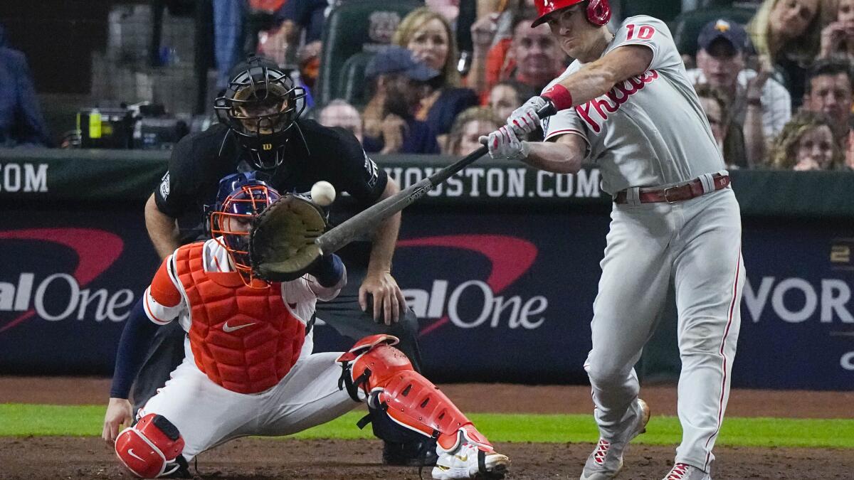 Cardinals score 4 in 9th, beat Nationals 9-7, reach NLCS