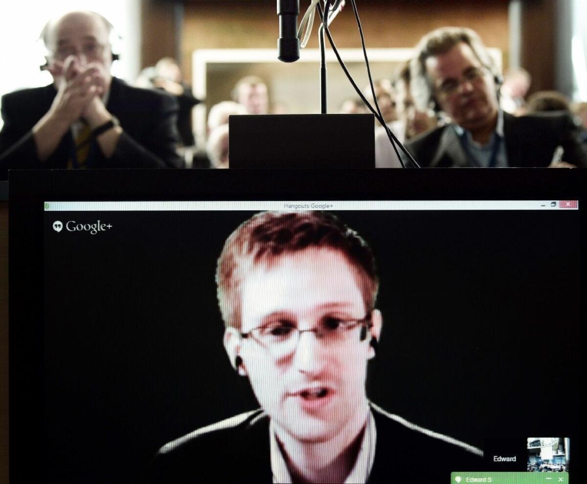 Edward Snowden speaks to European officials via videoconference during a parliamentary hearing on mass surveillance at the European Council in Strasbourg, France.