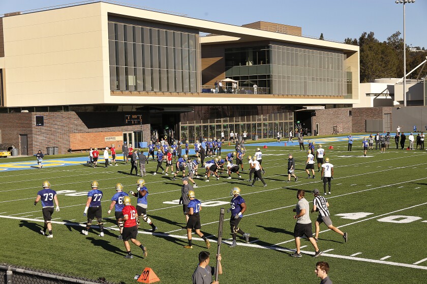 UCLA football players practice at Spaulding Field in March 2018.