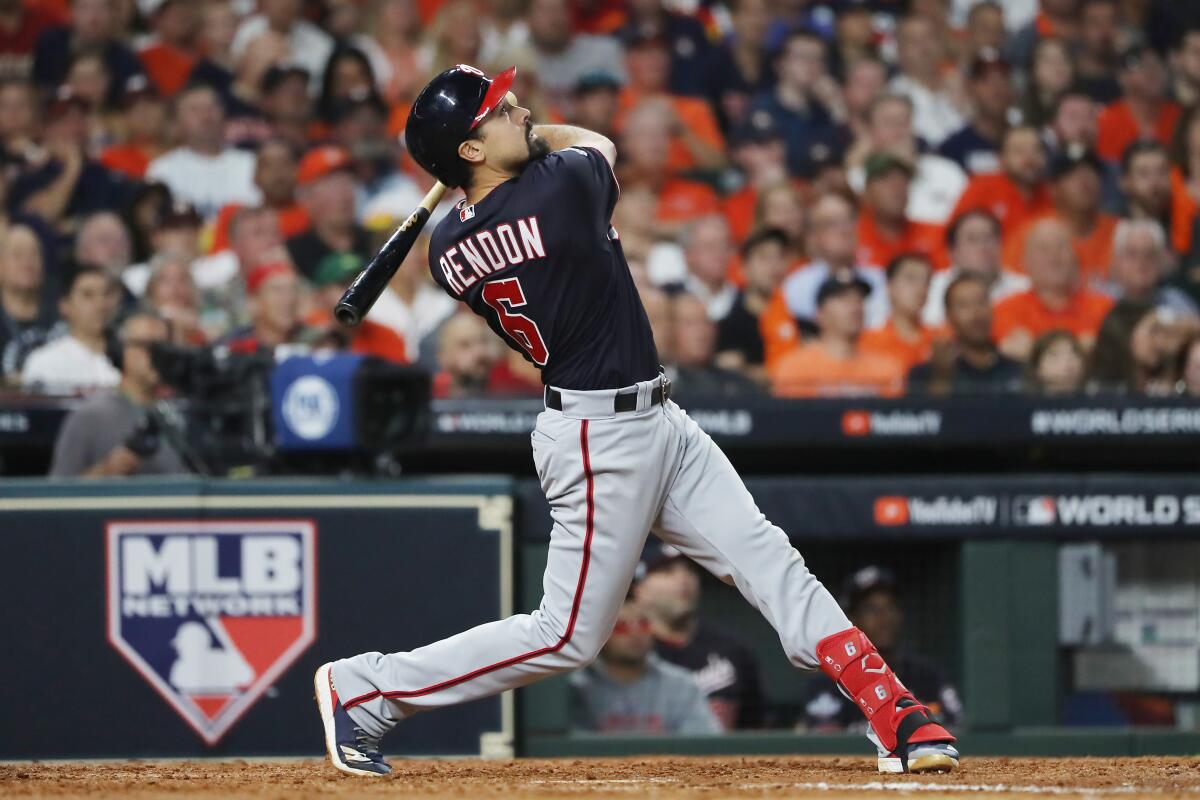 Anthony Rendon of the Washington Nationals takes a swing against the Houston Astros in the seventh inning of Game Two of the 2019 World Series.