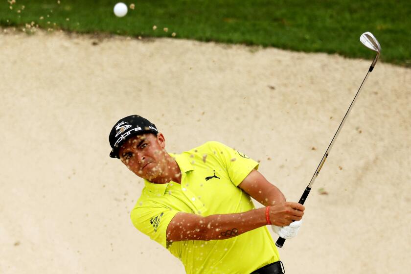 PLAYA DEL CARMEN, MEXICO - NOVEMBER 11: Rickie Fowler the United States plays a shot from a bunker on the 18th hole during the continuation of the second round of the OHL Classic at Mayakoba on November 11, 2017 in Playa del Carmen, Mexico. (Photo by Rob Carr/Getty Images) ** OUTS - ELSENT, FPG, CM - OUTS * NM, PH, VA if sourced by CT, LA or MoD **