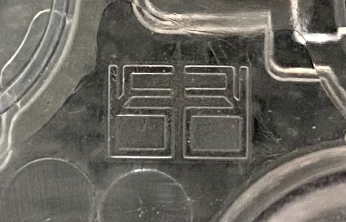 A Model S team surprised Balan by having her initials etched on the car's battery packaging.
