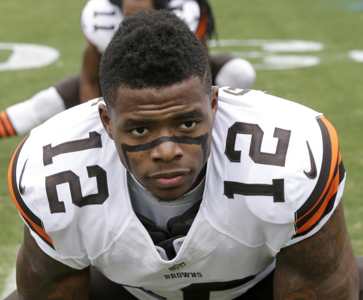 Josh Gordon stretches before a game against Carolina in December 2014.