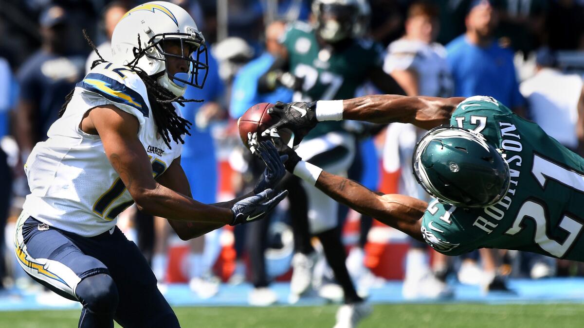 Eagles cornerback Patrick Robinson breaks up a pass intended for Chargers receiver Travis Benjamin during the first quarter.