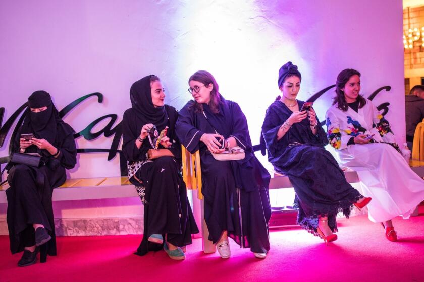 ONE TIME USE - Audience waiting before Alcomedy Club show, Jeddah, Saudi Arabia. Photo by Iman Al-Dabbagh for the Los Angeles Times.