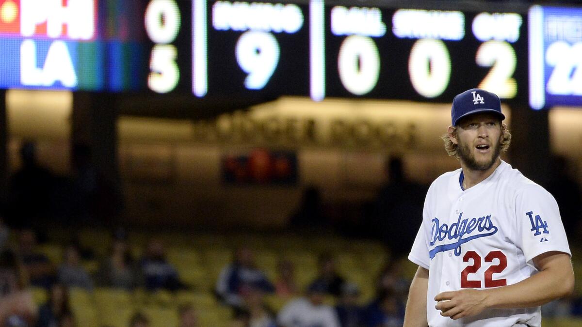 Dodgers starter Clayton Kershaw prepares to pitch the ninth inning in a 5-0 victory over the Phillies on Wednesday night at Dodger Stadium.