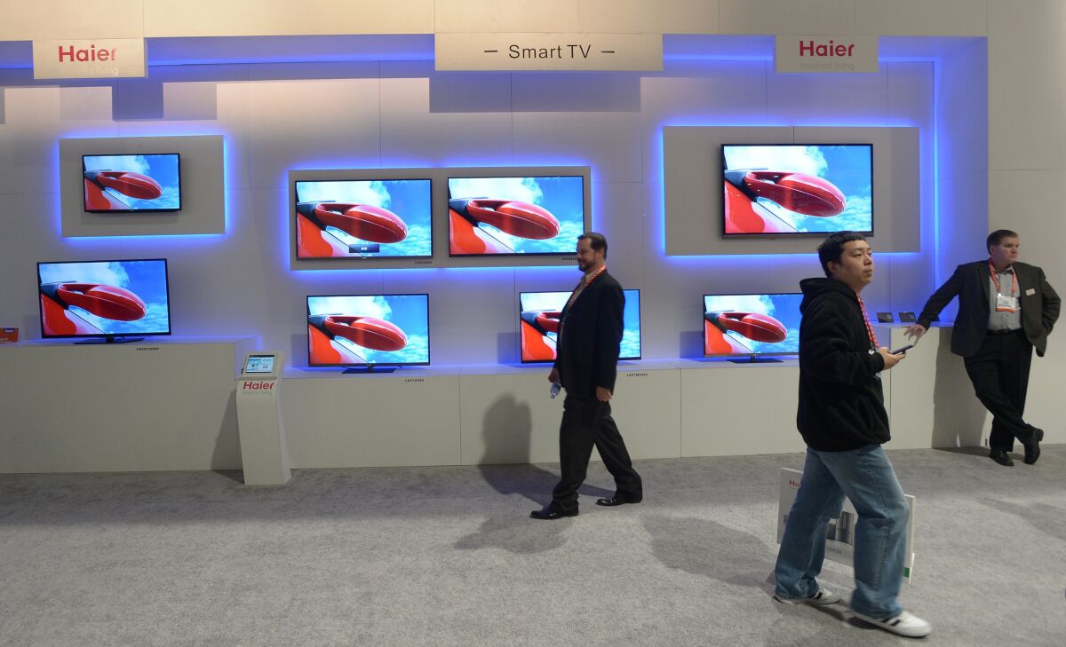 A new study from KPMG suggests that the majority of Americans now watch TV and access the Web simultaneously. However, consumers say they still prefer to watch video on the TV -- suggesting the next big disruptive technology in the living room may be the Internet-connected "smart TV," like these on display at the recent Consumer Electronics Show.