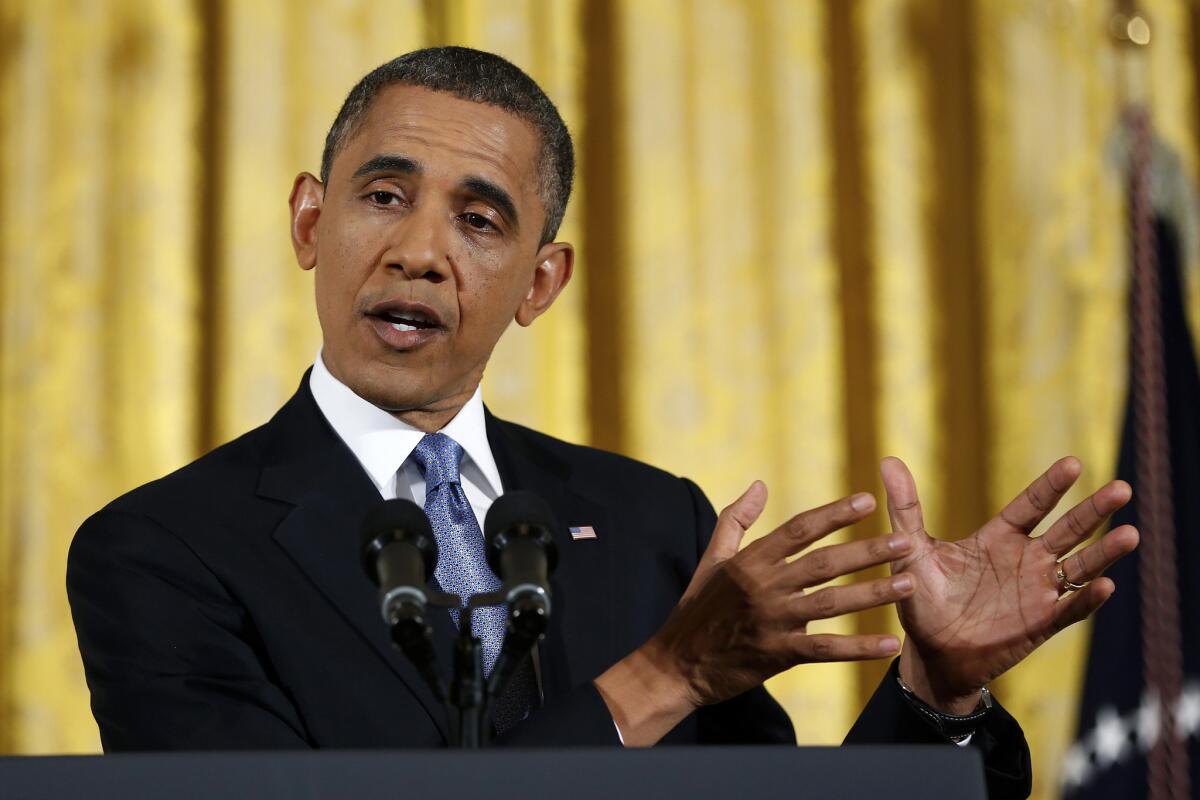 President Obama speaks during a news conference in the East Room of the White House.