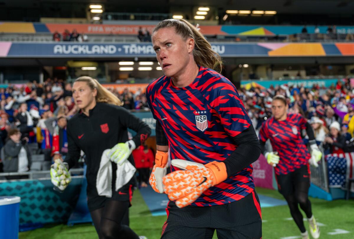 U.S. goalkeeper Alyssa Naeher runs onto the field during a game against Portugal at the Women's World Cup.