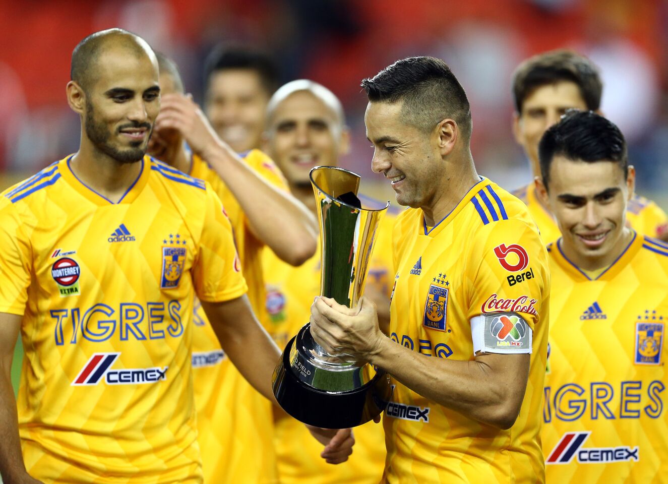 TORONTO, ON - SEPTEMBER 19: Juninho #3 of Tigres UANL prepares to lift the 2018 Campeones Cup Final trophy after victory against Toronto FC at BMO Field on September 19, 2018 in Toronto, Canada. (Photo by Vaughn Ridley/Getty Images) ** OUTS - ELSENT, FPG, CM - OUTS * NM, PH, VA if sourced by CT, LA or MoD **