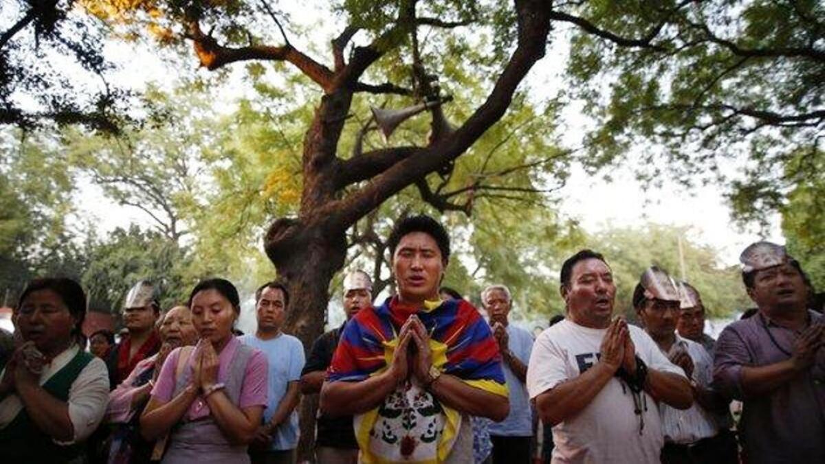 Tibetan exiles at a memorial in New Delhi on May 17, the day marked as International Tibet Solidarity Day. The vigil was held to pay homage to Tibetans who have self-immolated since 2009 for the cause of Tibet and its religious, cultural and political autonomy.