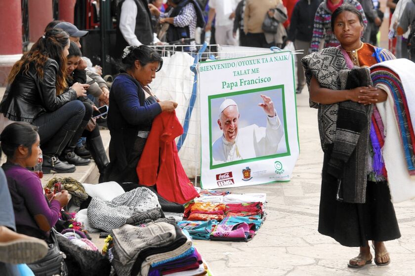 Indigenous women sell their wares in San Cristobal de Las Casas, in Mexico's Chiapas state, where Pope Francis will visit.
