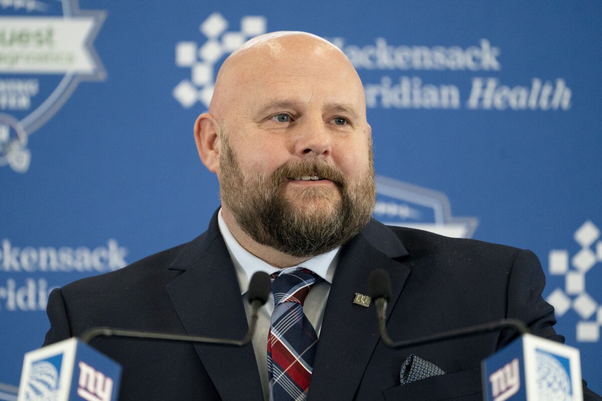 FILE - New York Giants new head coach Brian Daboll speaks during a news conference at the NFL football team's training facility, Monday, Jan. 31, 2022, in East Rutherford, N.J. Clubs that hired a new coach after the end of the 2021 regular season may begin offseason workouts Monday, April 4, 2022. Daboll laid out some his ground rules.(AP Photo/John Minchillo, File)
