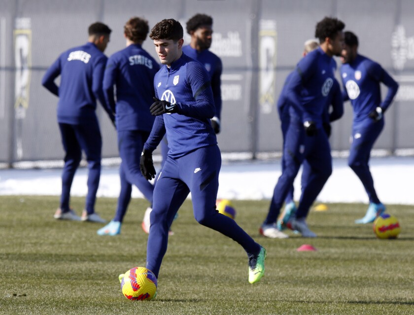 U.S. men's national team soccer forward Christian Pulisic practices in Columbus, Ohio, Wednesday, Jan. 26, 2022, ahead of Thursday's World Cup qualifying match against El Salvador. (AP Photo/Paul Vernon)