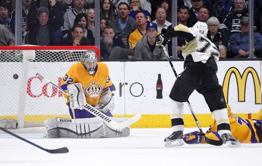 Pittsburgh right wing Patric Hornqvist shoots and scores the game-winning goal on Kings goalie Jonathan Quick on Saturday night at Staples Center.