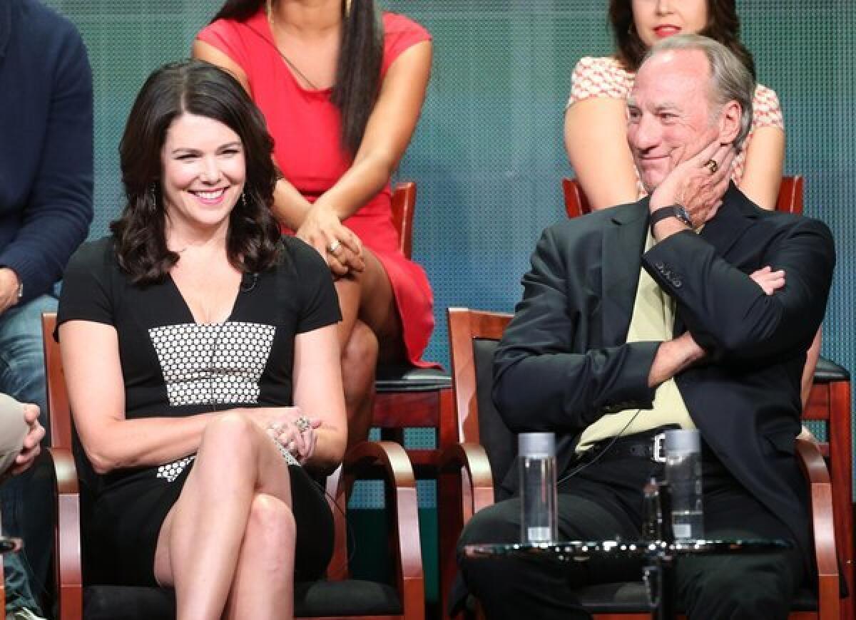 Lauren Graham, with "Parenthood" co-star Craig T. Nelson, takes part in a panel discussion in Beverly Hills during the 2013 Summer Television Critics Assn. tour.