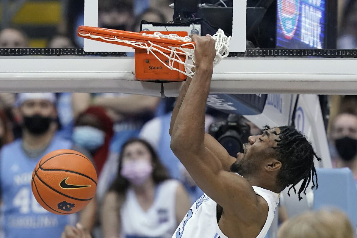 North Carolina guard Dontrez Styles dunks against Florida State during the second half of an NCAA college basketball game in Chapel Hill, N.C., Saturday, Feb. 12, 2022. (AP Photo/Gerry Broome)