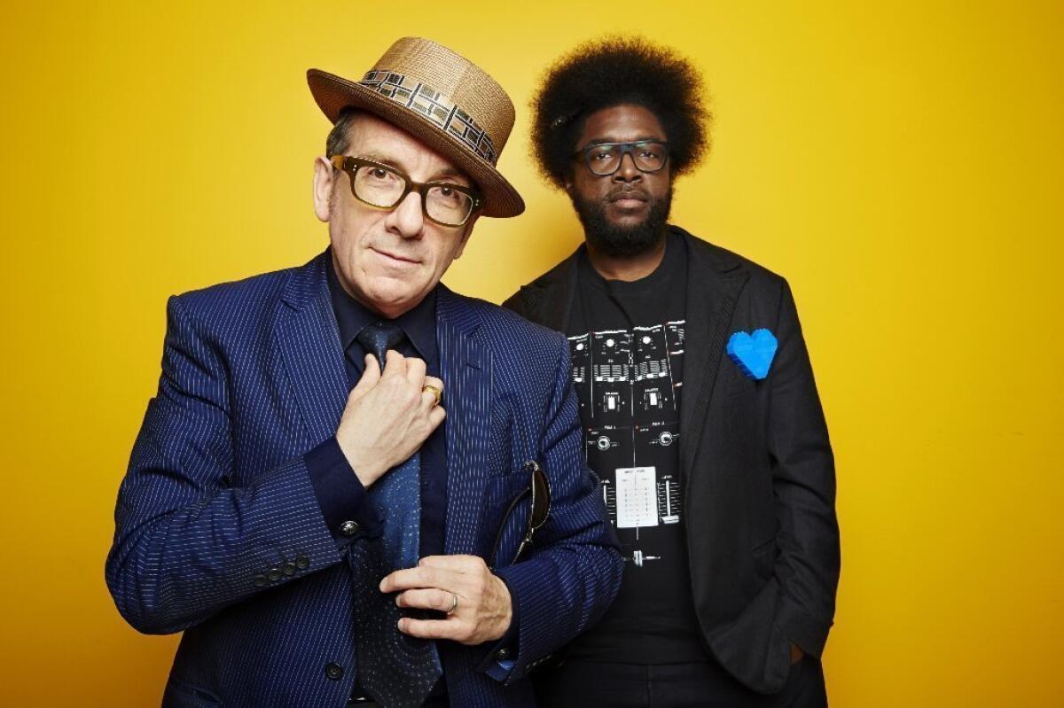 English singer-songwriter Elvis Costello, left, with drummer Ahmir "Questlove" Thompson of the Roots.