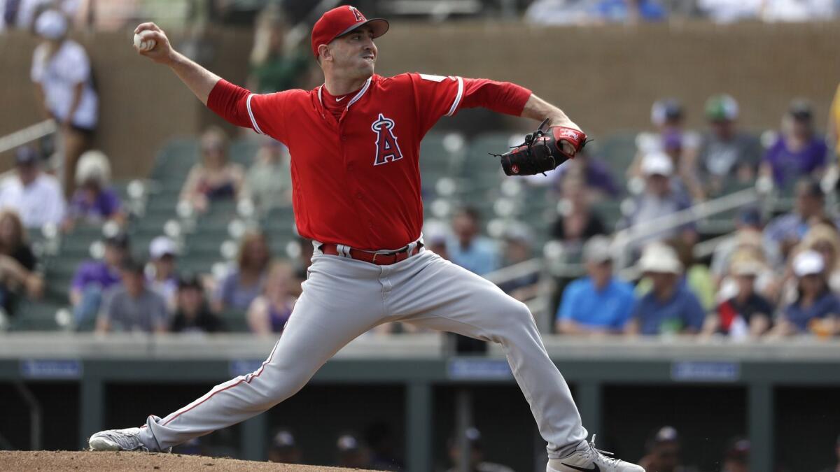 Angels starter Matt Harvey delivers during a three-inning outing against the Colorado Rockies on Wednesday in Scottsdale, Ariz.