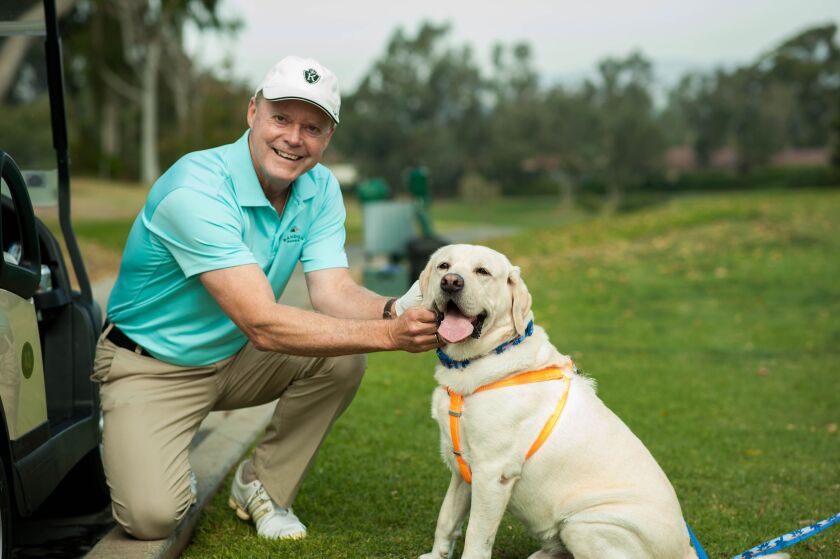 A player with a special friend on the golf course at a previous FACE tournament.