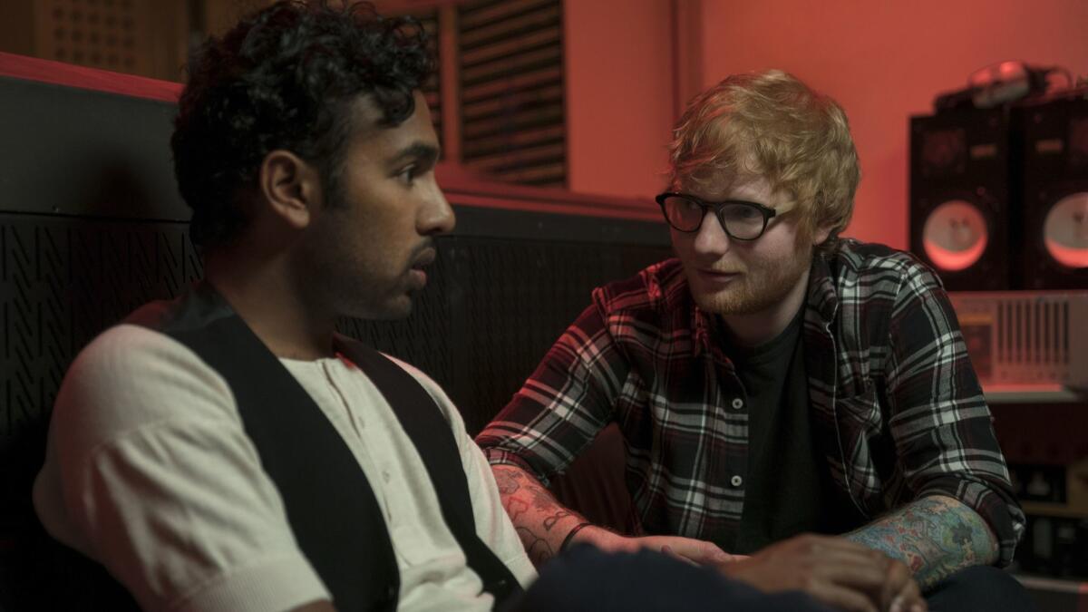 Actor Himesh Patel, left, and pop star Ed Sheeran as himself in a scene from director Danny Boyle's romantic comedy Yesterday."
