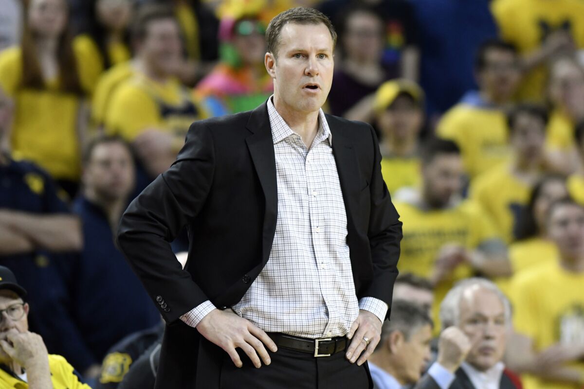 FILE - In this March 5, 2020, file photo, Nebraska head coach Fred Hoiberg watches his team compete against Michigan during the first half of an NCAA college basketball game in Ann Arbor, Mich. Hoiberg did a near total remake of the roster in his first year at Nebraska, and the Cornhuskers finished the season on a school-record 17-game losing streak. (AP Photo/Jose Juarez, File)