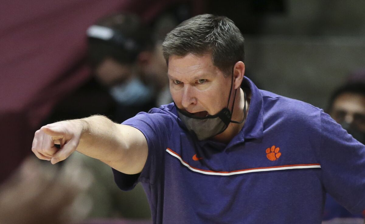 FILE - In this Dec. 15, 2020 file photo, Clemson head coach Brad Brownell in the first half of an NCAA college basketball game in Blacksburg Va. Brownell has received a contract extension that ties him to the Tigers through 2025-26 season. The university's trustees approved the new deal on Friday, Oct. 1, 2021. (Matt Gentry/The Roanoke Times via AP, Pool, File)