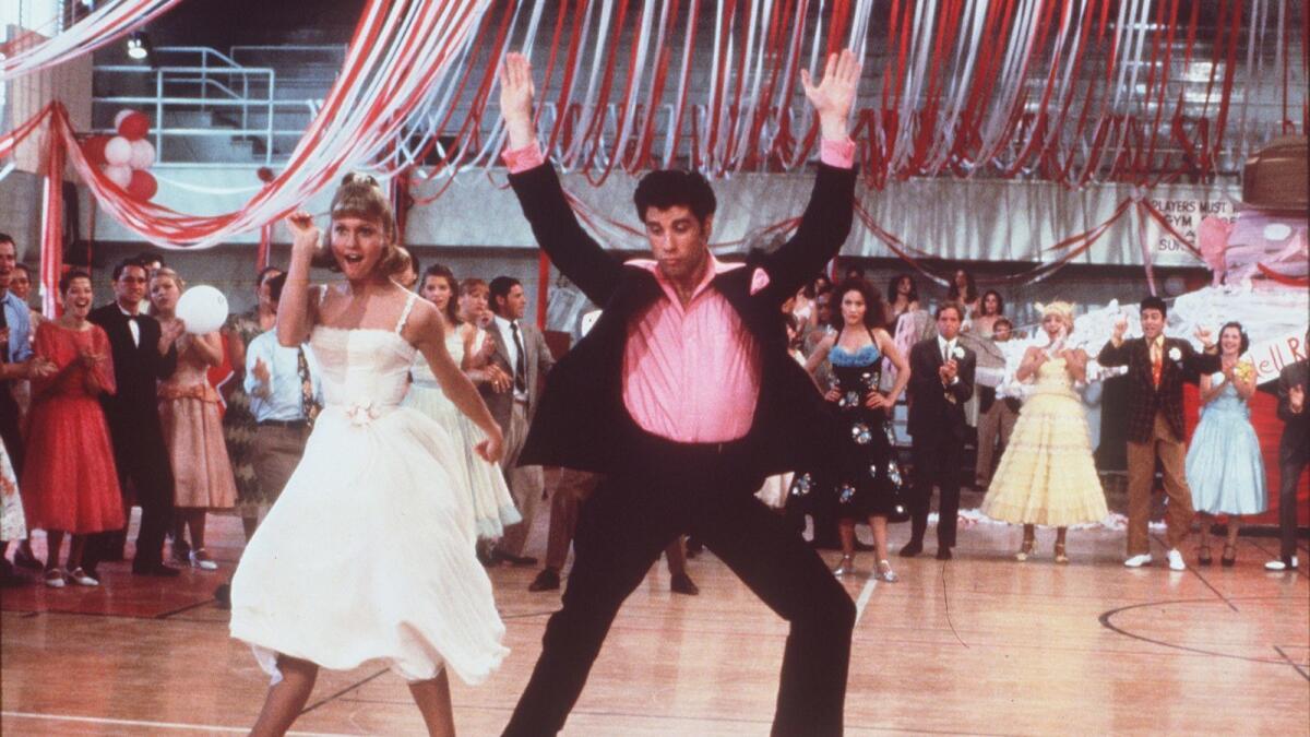 Olivia Newton-John and John Travolta star in the 1978 musical "Grease," which is getting a 40th anniversary sing-along screening on Saturday at the Hollywood Bowl.