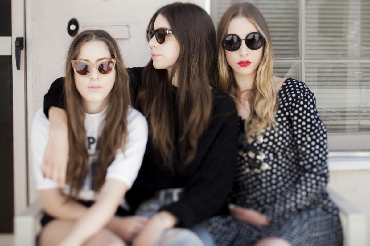 Haim is, from left, Alana, Danielle and Este Haim.