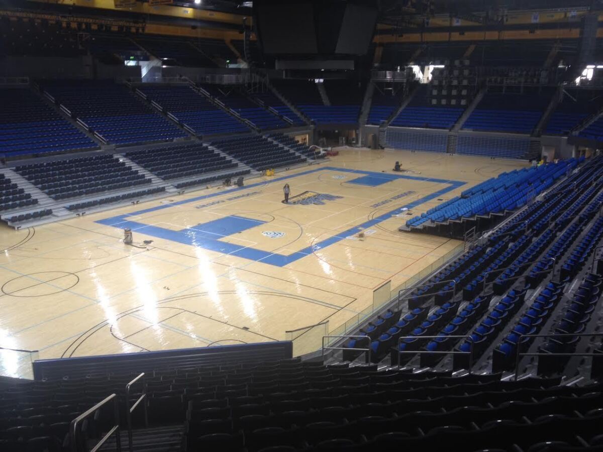 The blue strip of court inside Pauley Pavilion in front of the team benches now features “WESCOM” in white block letters as part of a 10-year, $38-milllion sponsorship agreement between the credit union and the school.