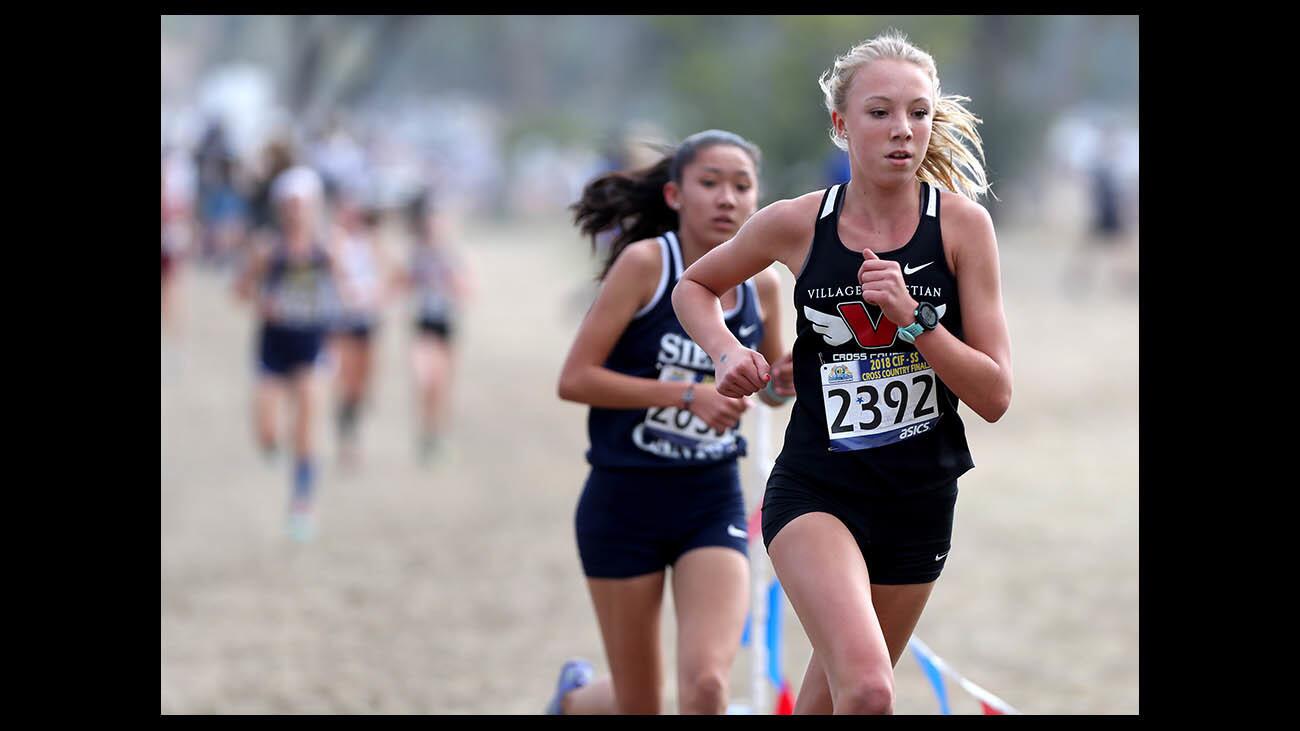 Village Christian High School runner Mia barnett won the individual title in the girlsâ€šÃ„Ã´ division 5 race at the CIF Southern Section cross country finals, at Riverside City Cross Country Course in Riverside on Saturday, Nov. 17, 2018.