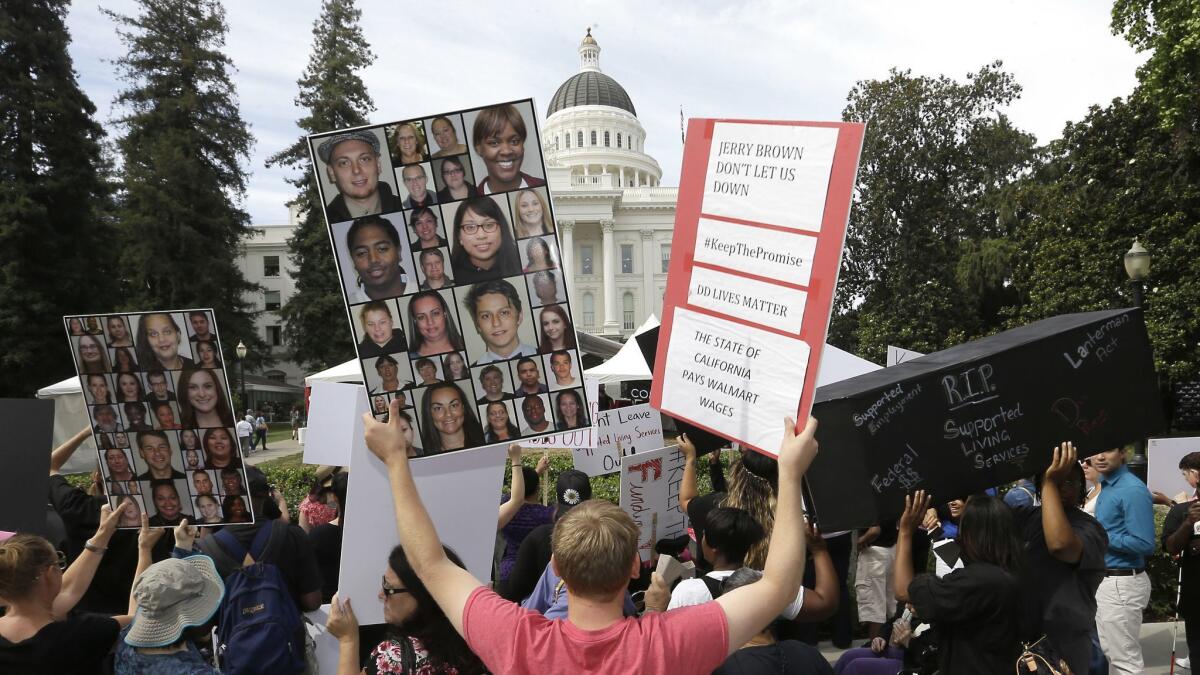 Advocates for the disabled marched in 2015 to the state Capitol protest for funding for additional services for the developmentally disabled after funding was cut from the state budget.