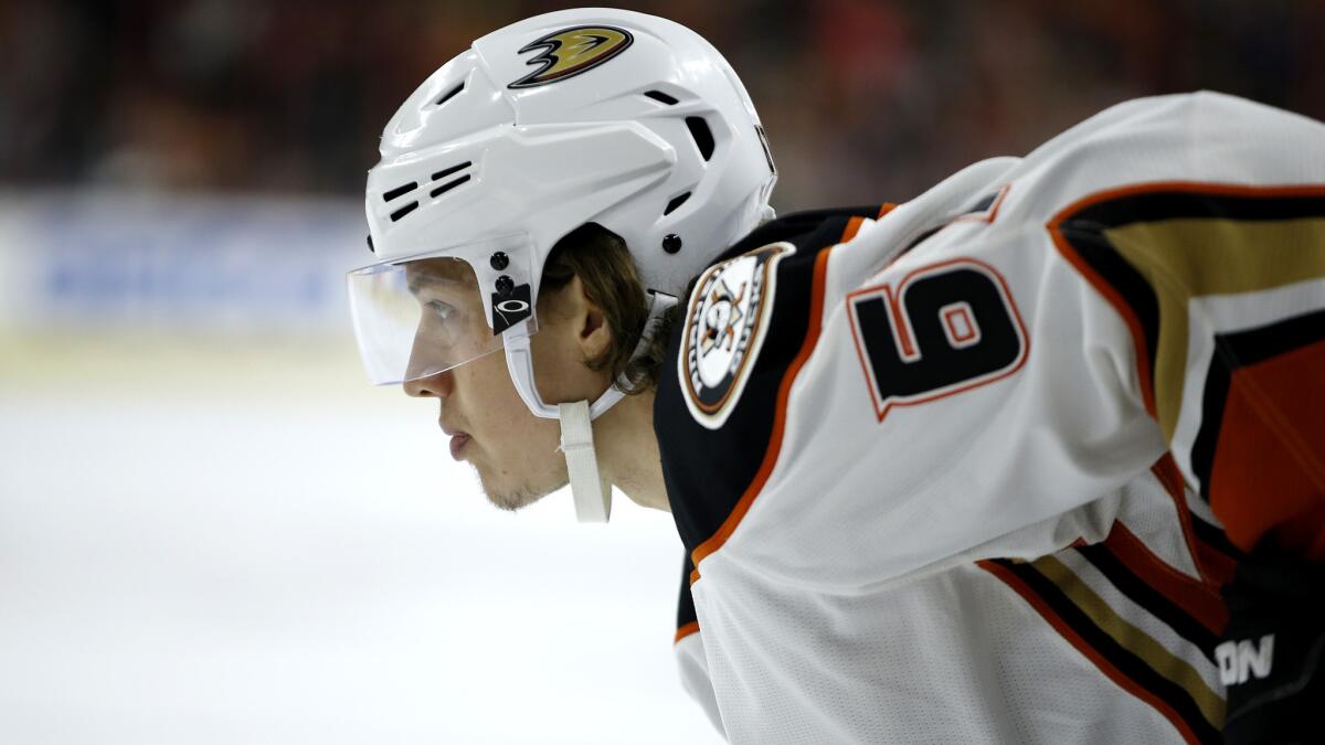 Ducks center Rickard Rakell gets set for a faceoff during a game against the Flyers.