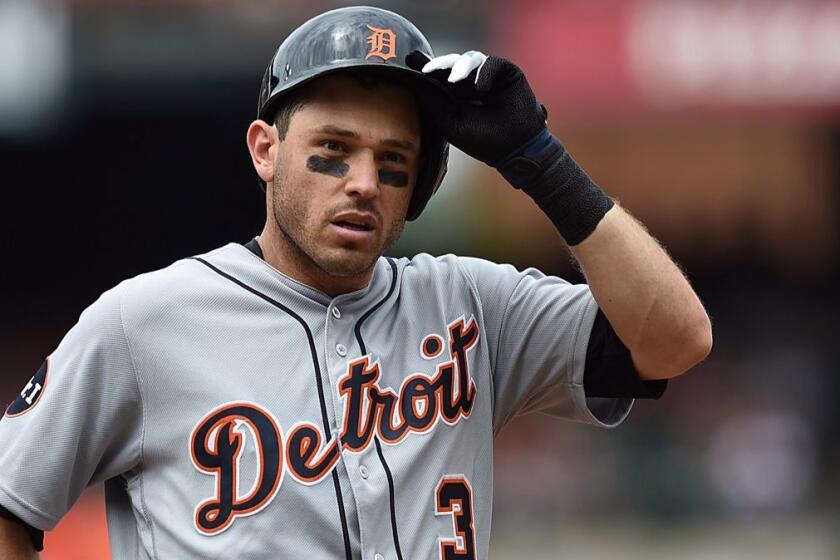 Detroit Tigers' Ian Kinsler removes his batting helmet after popping out with two on against the Baltimore Orioles in the fourth inning of a baseball game, Sunday, Aug. 6, 2017, in Baltimore. The Orioles won 12-3. (AP Photo/Gail Burton)
