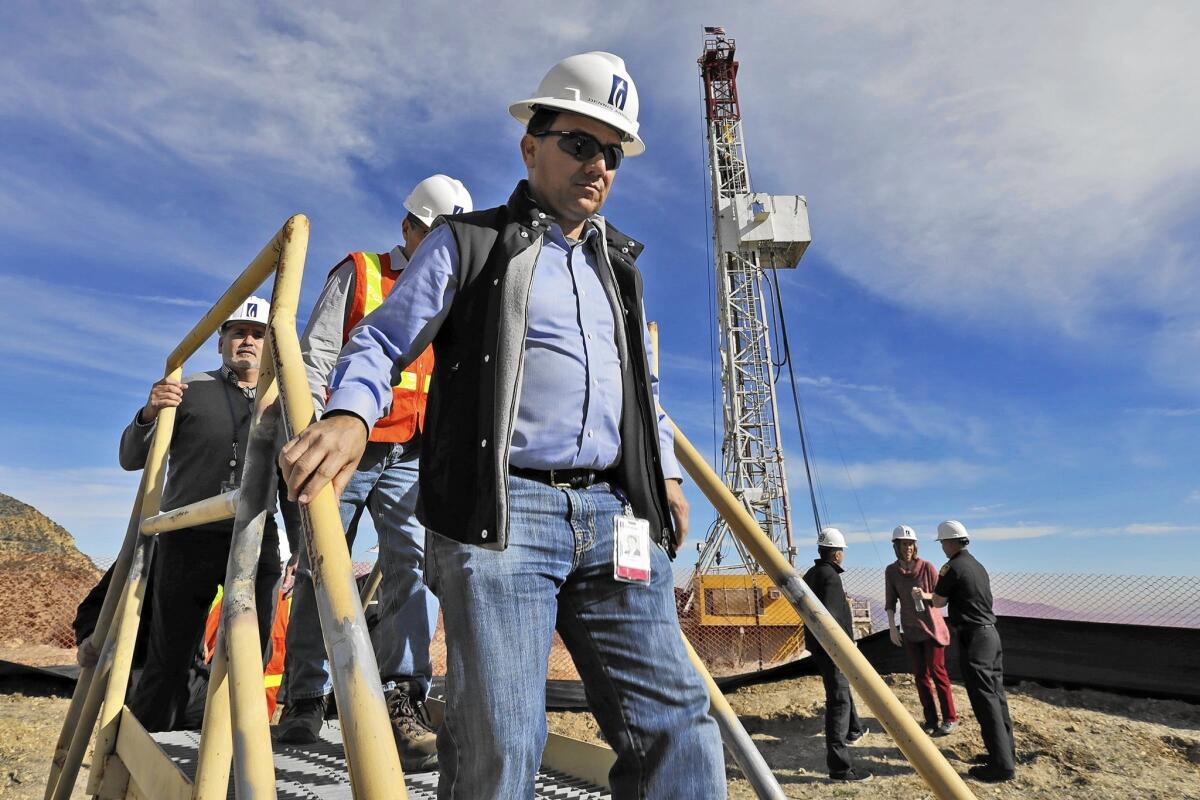 Southern California Gas Co. President and CEO Dennis Arriola, left, at the drilling of relief well in Porter Ranch last month.