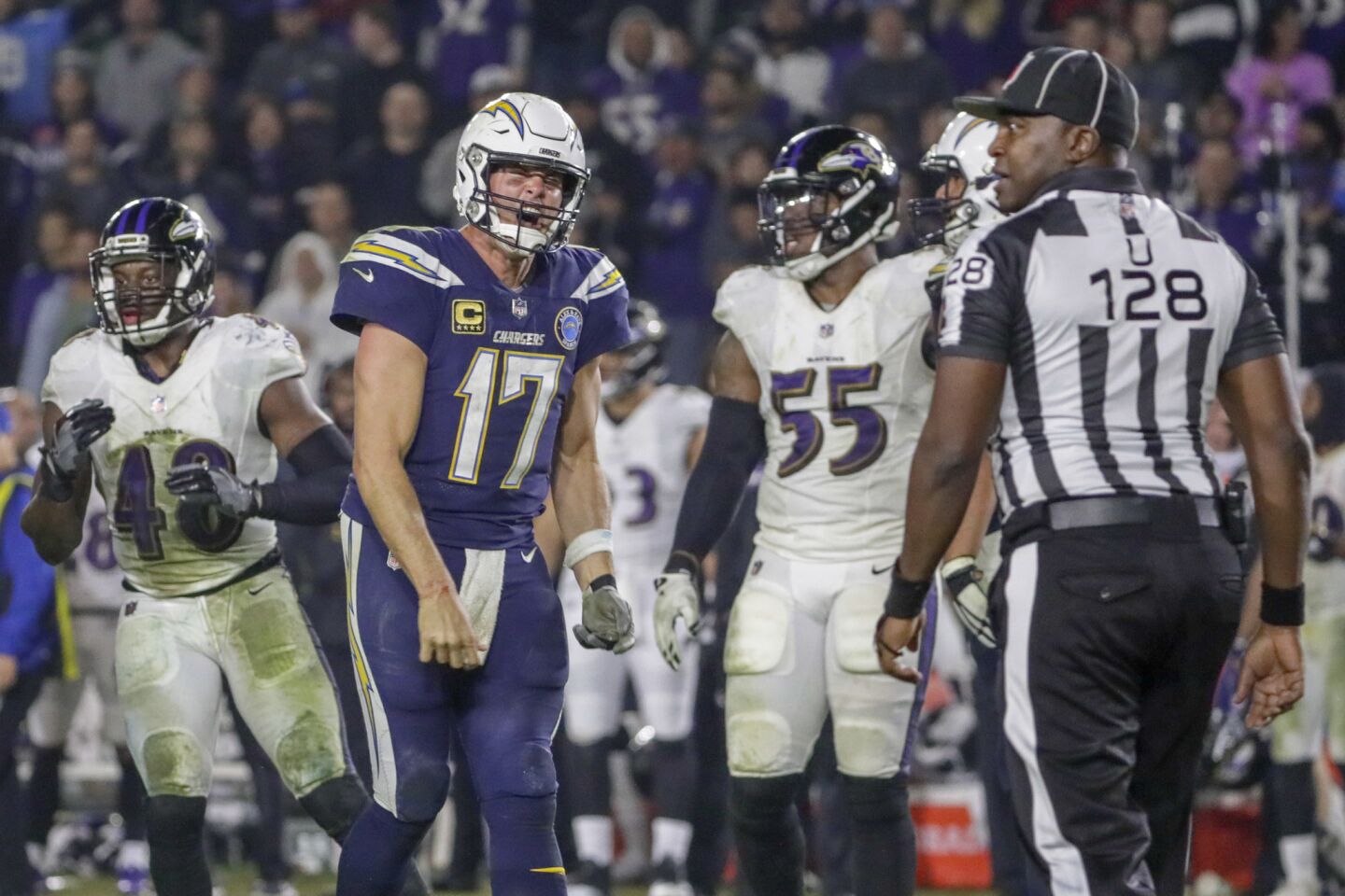 Chargers quarterback Philip Rivers barks at umpire Ramon George late in the game at StubHub Center.