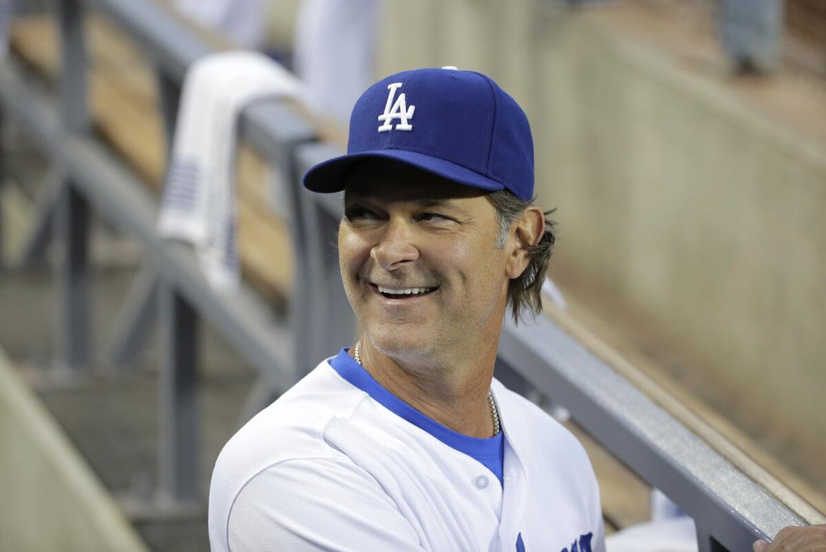 Dodgers Manager Don Mattingly, shown on Sept. 22, surely is enjoying the team's day away from the media on Wednesday.