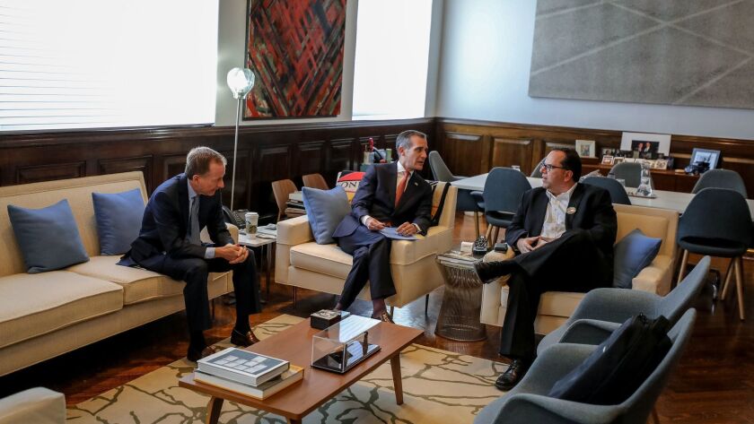 L.A. Unified Supt. Austin Beutner, left, Mayor Eric Garcetti and UTLA President Alex Caputo-Pearl meet during negotiations to end the 2019 teachers' strike.