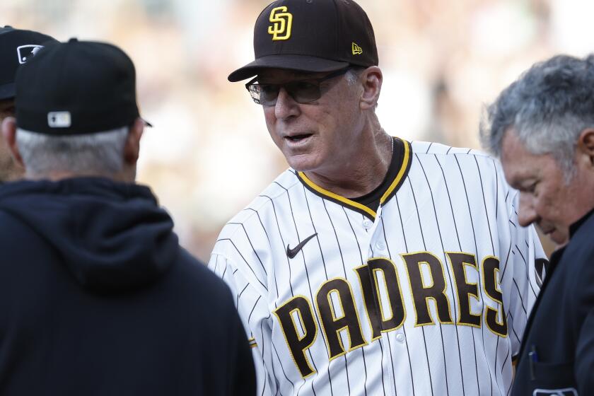 San Diego, CA - July 24: San Diego Padres manager Bob Melvin delivers the line up cards before a game against the Pittsburgh Pirates at Petco Parks on Monday, July 24, 2023. (K.C. Alfred / The San Diego Union-Tribune)