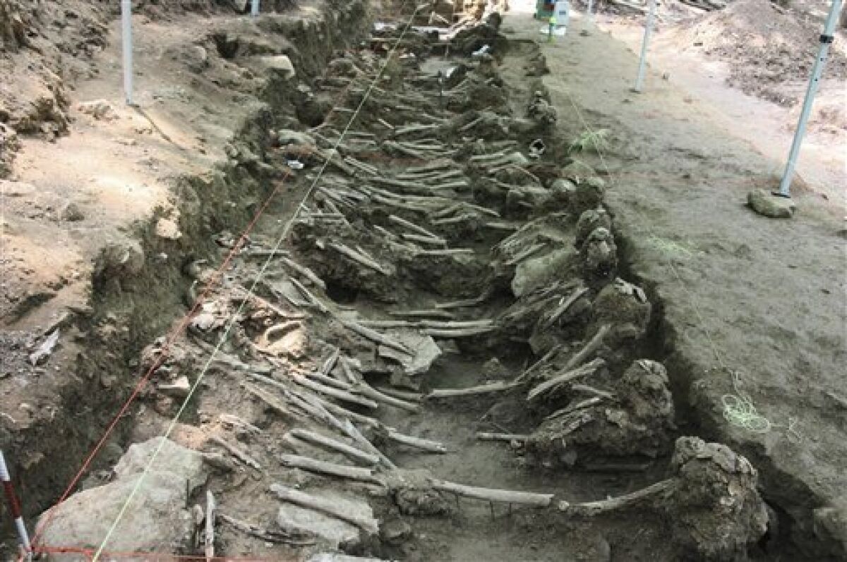 This July 7, 2008, photo released by South Korea's Truth and Reconciliation Commission shows human skeletons unearthed at a site in Gongju, South Korea. Shutting down its inquiry into South Korea's hidden history, a century of human rights abuses, the commission will leave unexplored scores of other suspected mass graves believed to hold remains of tens of thousands of South Korean political detainees summarily executed by their government early in the 1950-53 war, sometimes as U.S. officers watched. In a political about-face, the commission, also investigating the U.S. military's large-scale killing of Korean War refugees, has ruled the Americans in case after case acted out of military necessity. (AP Photo/Truth and Reconciliation Commission, Republic of Korea) NO SALES