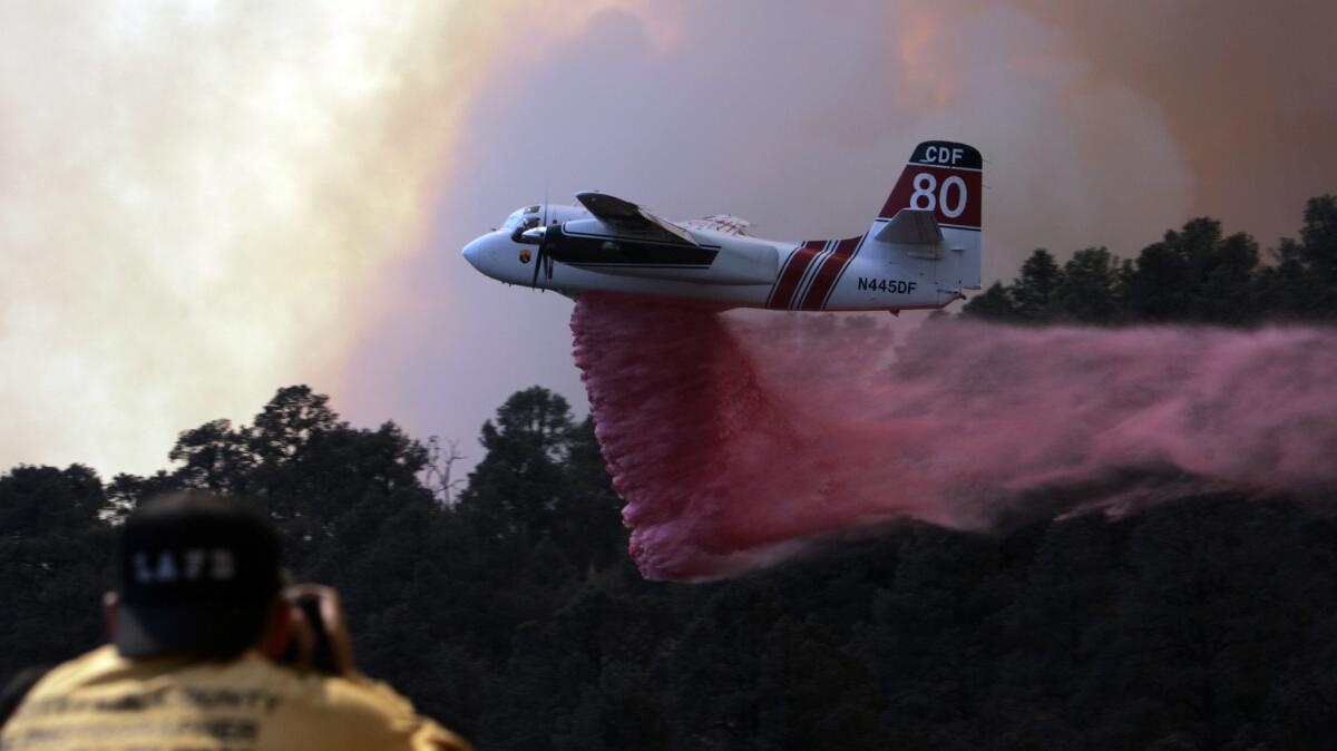 A plane is used to battle the Zaca fire in 2007.