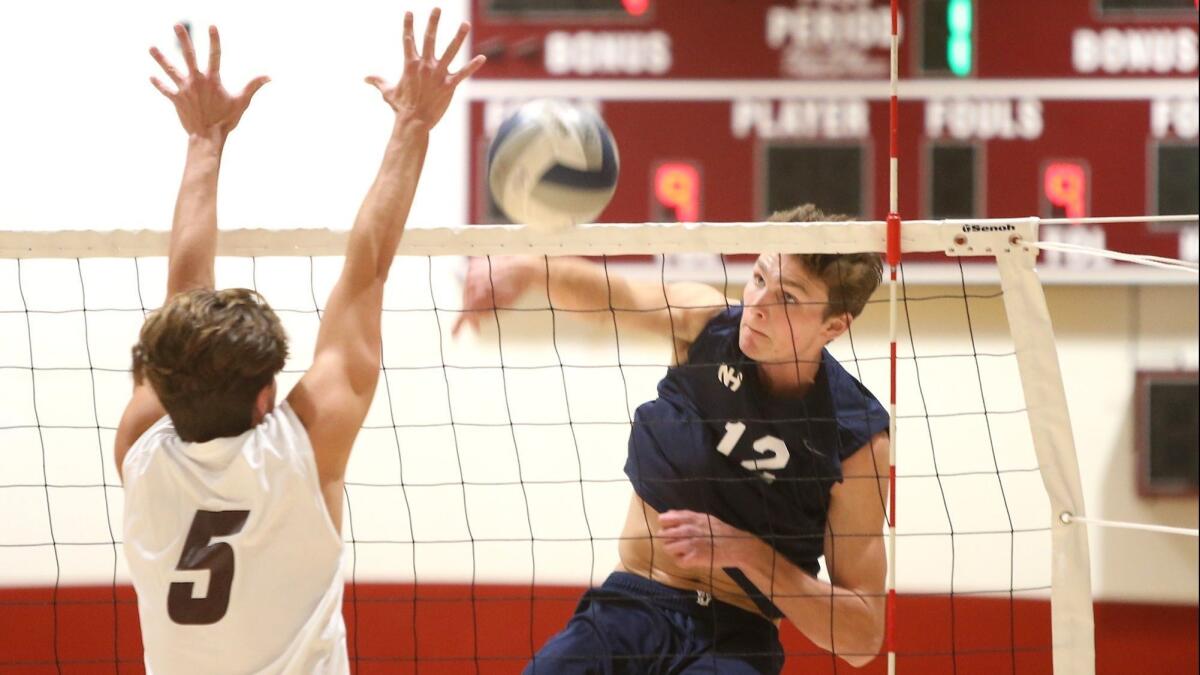 Newport Harbor High's Dayne Chalmers, right, has committed to the UC Santa Barbara men's volleyball program.