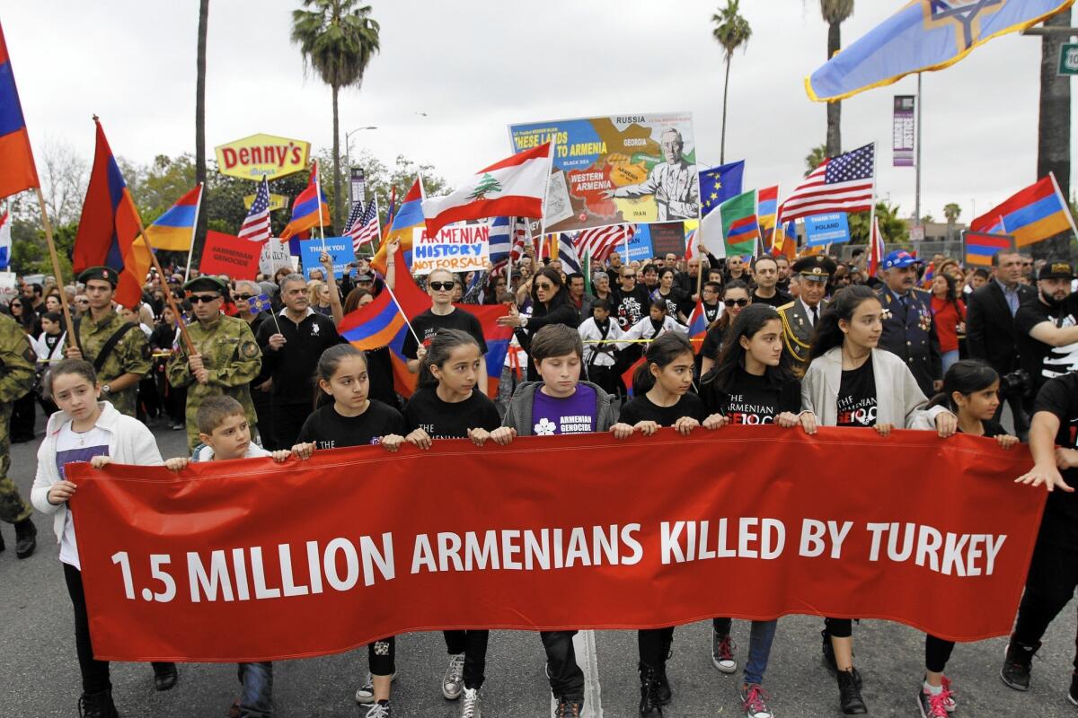 Children carry a banner indicating the number of Armenians who were killed by the Ottoman Empire, present day Turkey, in 1915. The children were among tens of thousands of participants in the March for Justice, commemorating the 100th anniversary of the Armenian Genocide.