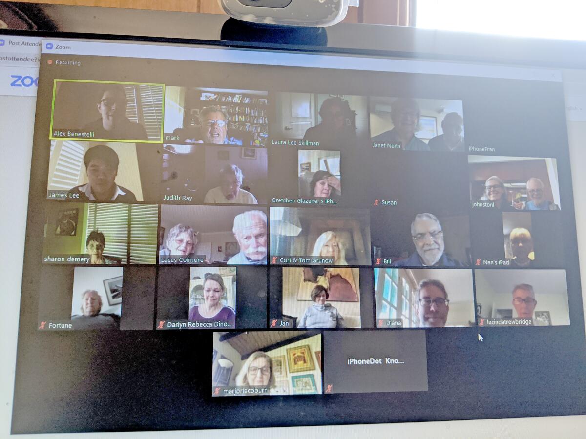 A video chat session via the Zoom app is used by parishioners from St. James by-the-Sea Episcopal Church as a prayer group; as pictured in March 2020. Recorded sermons are uploaded to the church’s YouTube channel, which are embedded on its website: sjbts.org