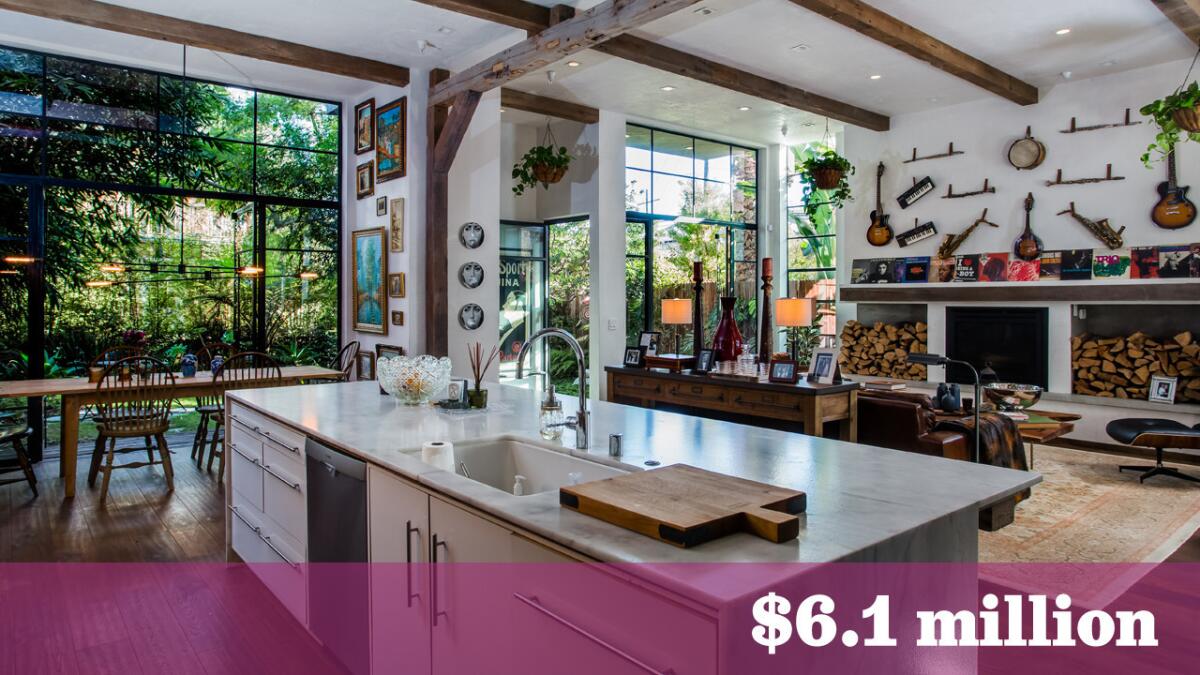 Music executive Neil Jacobson and his wife, textile entrepreneur Celine Gumbiner Jacobson, have sold their house in Venice for $6.1 million. The couple have commissioned Venice-based designer Kim Gordon to design their new house in Beverly Hills.
