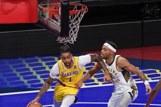 LAS VEGAS, NV - DECEMBER 9: D'Angelo Russell #1 of the Los Angeles Lakers dribbles.