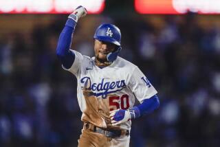 Los Angeles Dodgers' Mookie Betts celebrates while running the bases on his home run against the Arizona Diamondbacks during the sixth inning of a baseball game Tuesday, Aug. 29, 2023, in Los Angeles. (AP Photo/Ryan Sun)