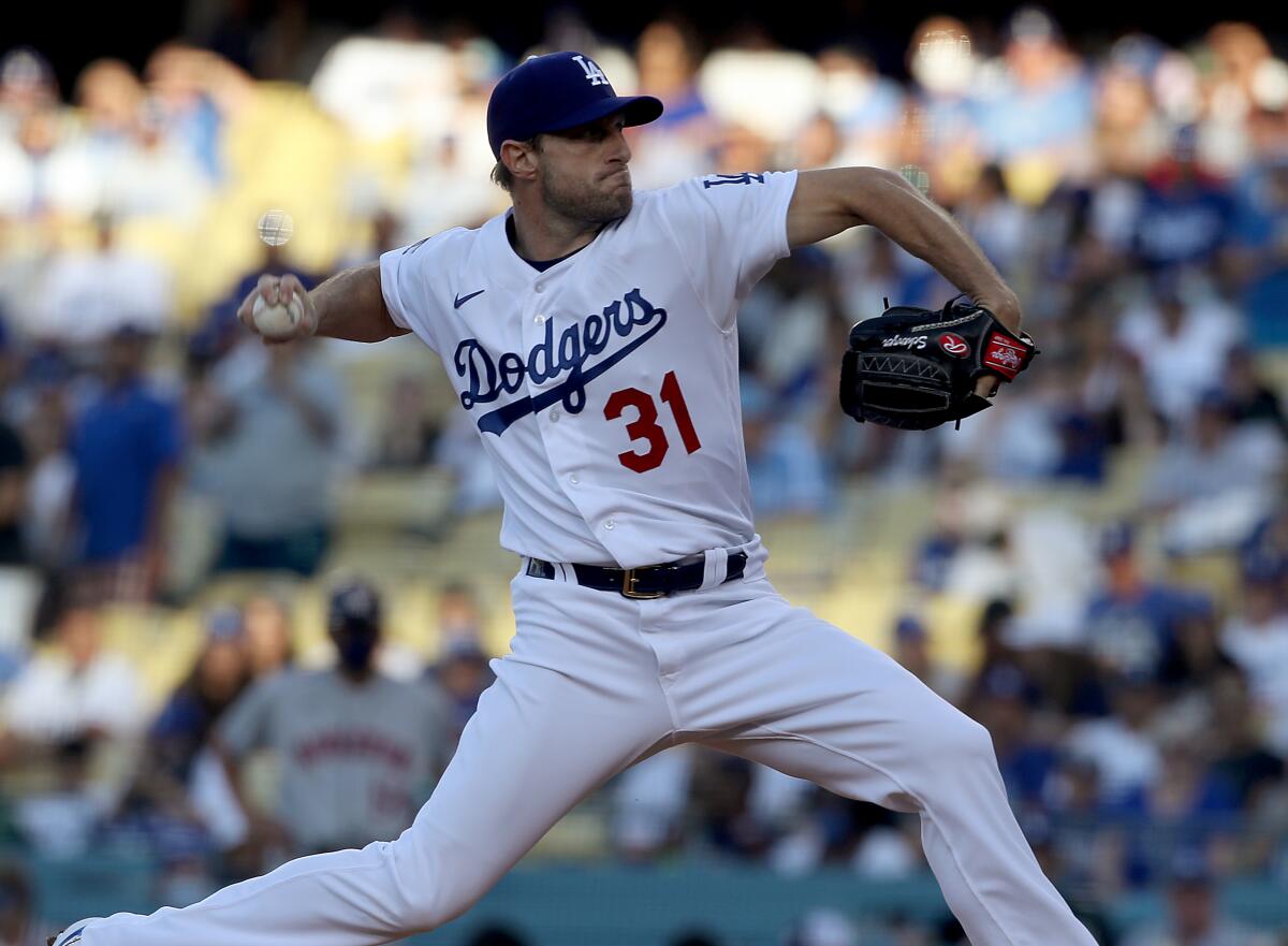 Dodgers pitcher Matt Scherzer delivers a pitch against the Houston Astros.