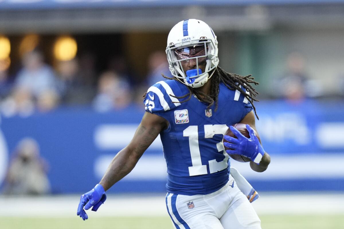 Indianapolis Colts' T.Y. Hilton (13) runs after a catch during the second half of an NFL football game against the Houston Texans, Sunday, Oct. 17, 2021, in Indianapolis. (AP Photo/AJ Mast)