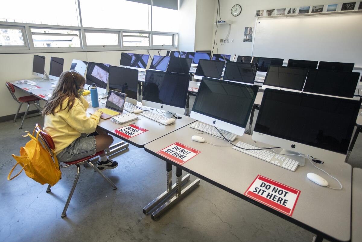 Alaina Ortiz attends her video editing class on campus for the first time in more than a year